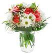 This vibrant floral arrangement, expertly crafted by the team at East Ham Flowers, brings a sense of lighthearted joy and contemporary elegance, reminiscent of a fresh spring morning in East Ham. At its heart, fluffy coral-pink carnations, their ruffled edges lively and full of character, radiate warmth and happiness. Encircling them are snowy white chrysanthemums and smaller daisies with green-gold centres, resembling tiny suns that infuse the bouquet with a playful, optimistic spirit. Wisps of delicate baby's breath are woven between the main flowers, lending a light, airy touch that softens the silhouette beautifully. Glossy and matte green foliage creates a lush frame, wrapping the composition in natural abundance and offering a refreshing contrast to the lighter hues. From the left, magenta-purple alstroemeria buds peek out, hinting at continued blossoming and a perpetual sense of possibility. Arranged in a classic clear glass vase, stems shine beneath sparkling water, grounding the bouquet in simple, organic beauty. The entire display pops against a crisp white background, the even lighting drawing out every detail without a hint of shadow. Whether offered as a birthday surprise, a thoughtful gesture for a neighbour along the Romford Road, or simply to uplift a loved one's spirits, this bouquet radiates positivity, warmth, and the distinctive charm of East Ham's local floristry.